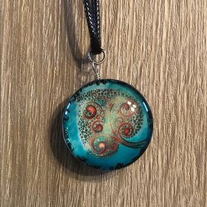 Black nylon necklace with glass charm